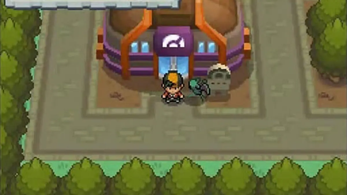 Capture d'ecran de Pokemon Heart & Soul sur Game Boy Advance montrant le heros dans Johto avec un Pokemon suiveur
